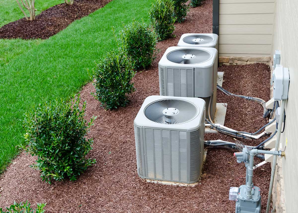 set of AC units outside a home
