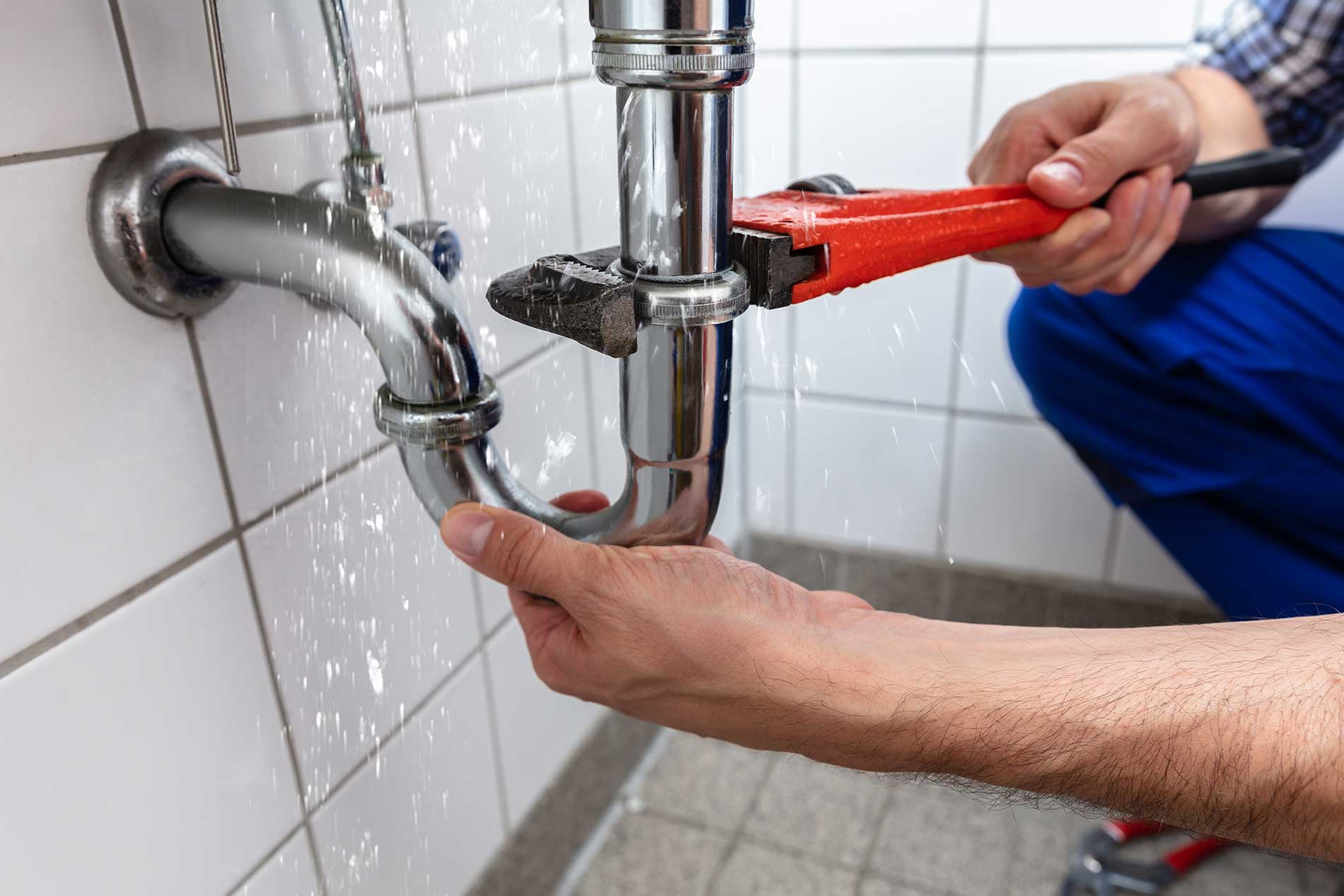 Plumber Repairing Sink Pipe Leakage Plumber Repairing Sink Pipe Leakage